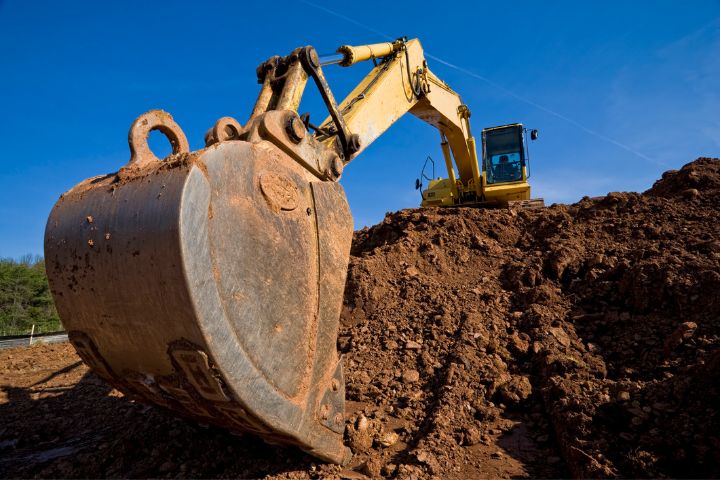 Decorative: Bulldozer on a pile of earth