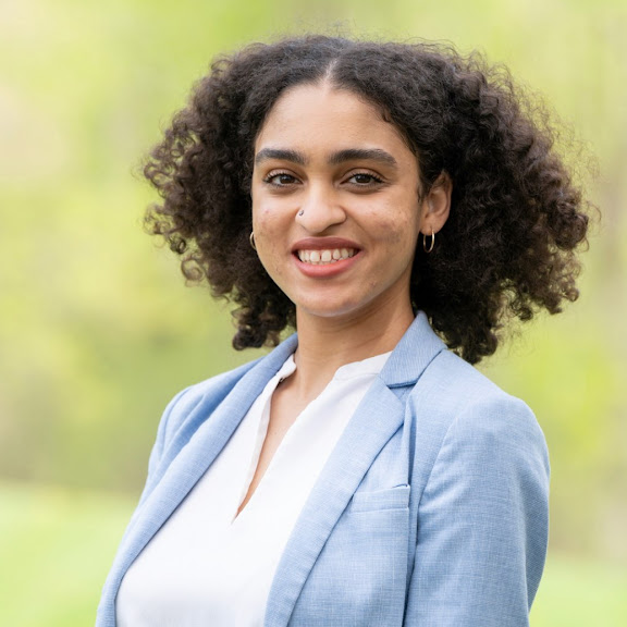 Mia McPherson smiling in a headshot photo